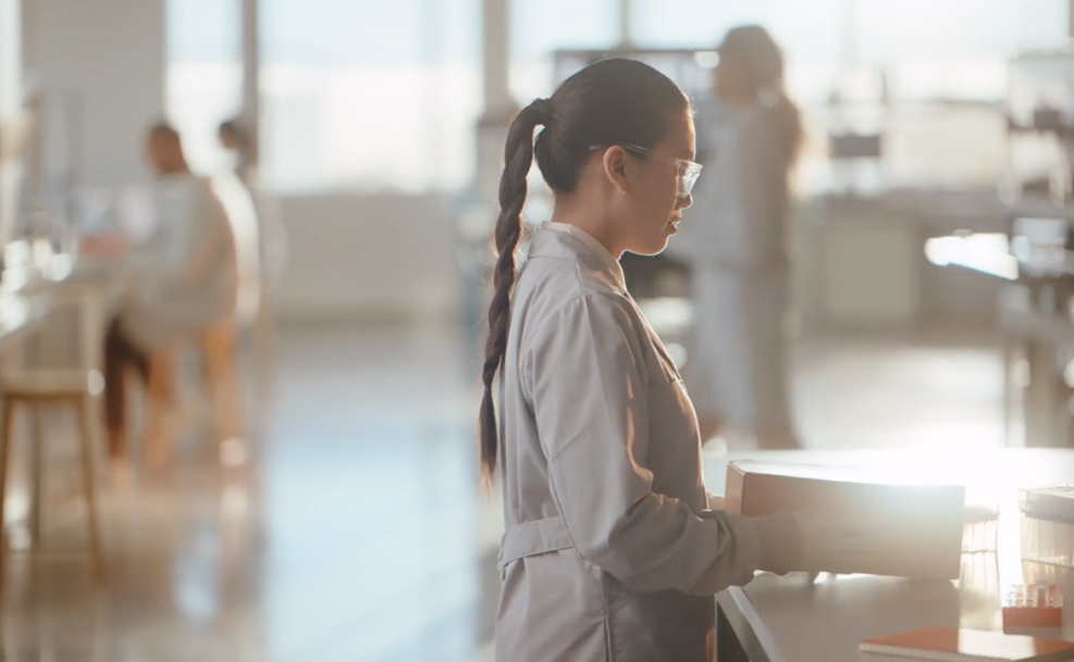 research scientist unboxing Illumina products