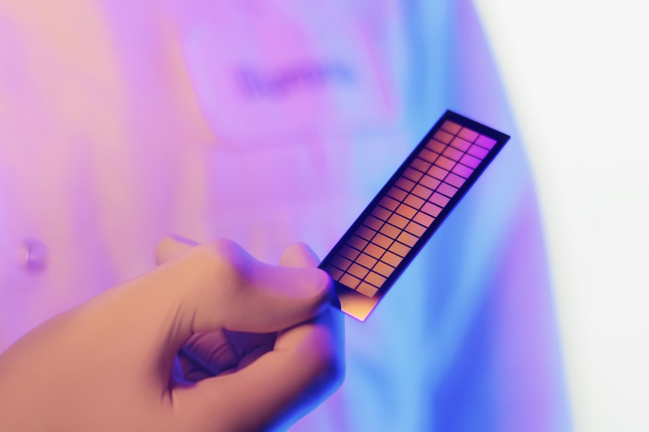 Scientist holding beadchip